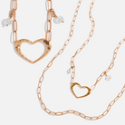 Katia Designs antique gold long chain necklace with open heart pendant, stylish jewelry accessory for women