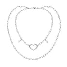 Katia Designs long chain necklace with an open heart pendant in antique gold, elegant jewelry for special occasions.