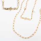 Katia Designs Manifestor long chain necklace in antique gold, featuring a stylish, elegant design with intricate detailing.