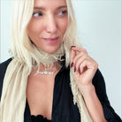 Katia Designs Manifestor long chain necklace in antique gold with intricate links and elegant style.
