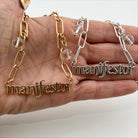 Katia Designs Manifestor Long Chain Necklace in antique gold with intricate link details, stylish and elegant jewelry piece.