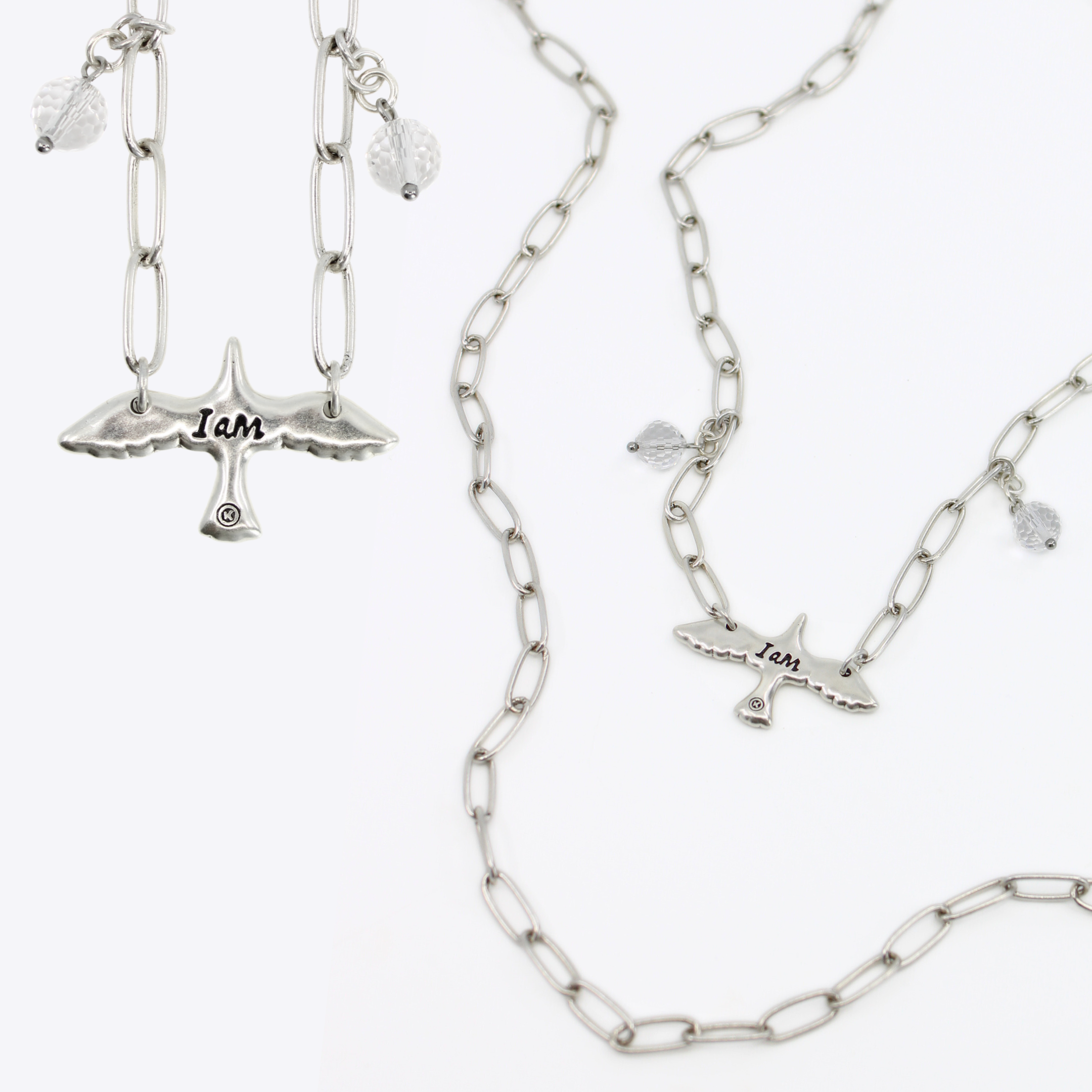 Katia Designs I Am Bird long silver chain necklace with bird pendant, stylish and elegant jewelry accessory.