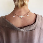 Silver I Am Bird long chain necklace by Katia Designs featuring a delicate bird pendant on a sleek chain.