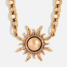 Katia Designs antique gold midi sun choker necklace with a graceful sun pendant, stylish and elegant jewelry accessory.