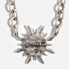 Katia Designs antique gold midi choker necklace featuring a grateful sun pendant, stylish jewelry for layered or statement looks.