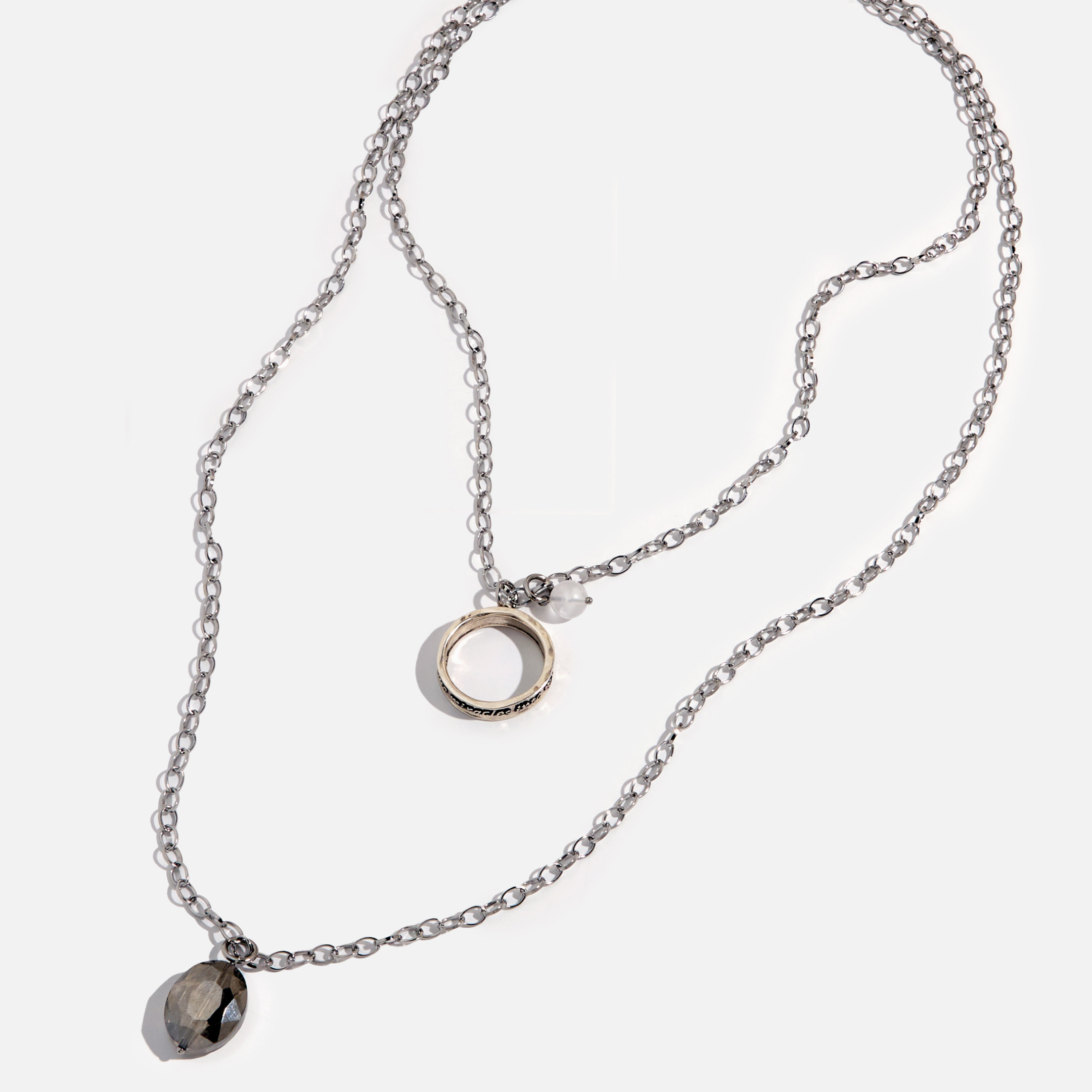 Katia Designs original antique gold necklace with clear AB crystal accents and a ring-shaped pendant engraved with "I Welcome Miracles".