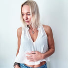 Katia Designs I Welcome Miracles Necklace featuring an antique gold chain and clear AB crystal pendant.
