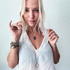 Katia Designs gold original necklace with clear AB crystal, featuring a bold "Remember Who the F*ck You Are" ring design.