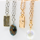 Katia Designs Breathe Original Lite Necklace with antique gold finish and aqua quartz pendant, lightweight and elegant jewelry piece.