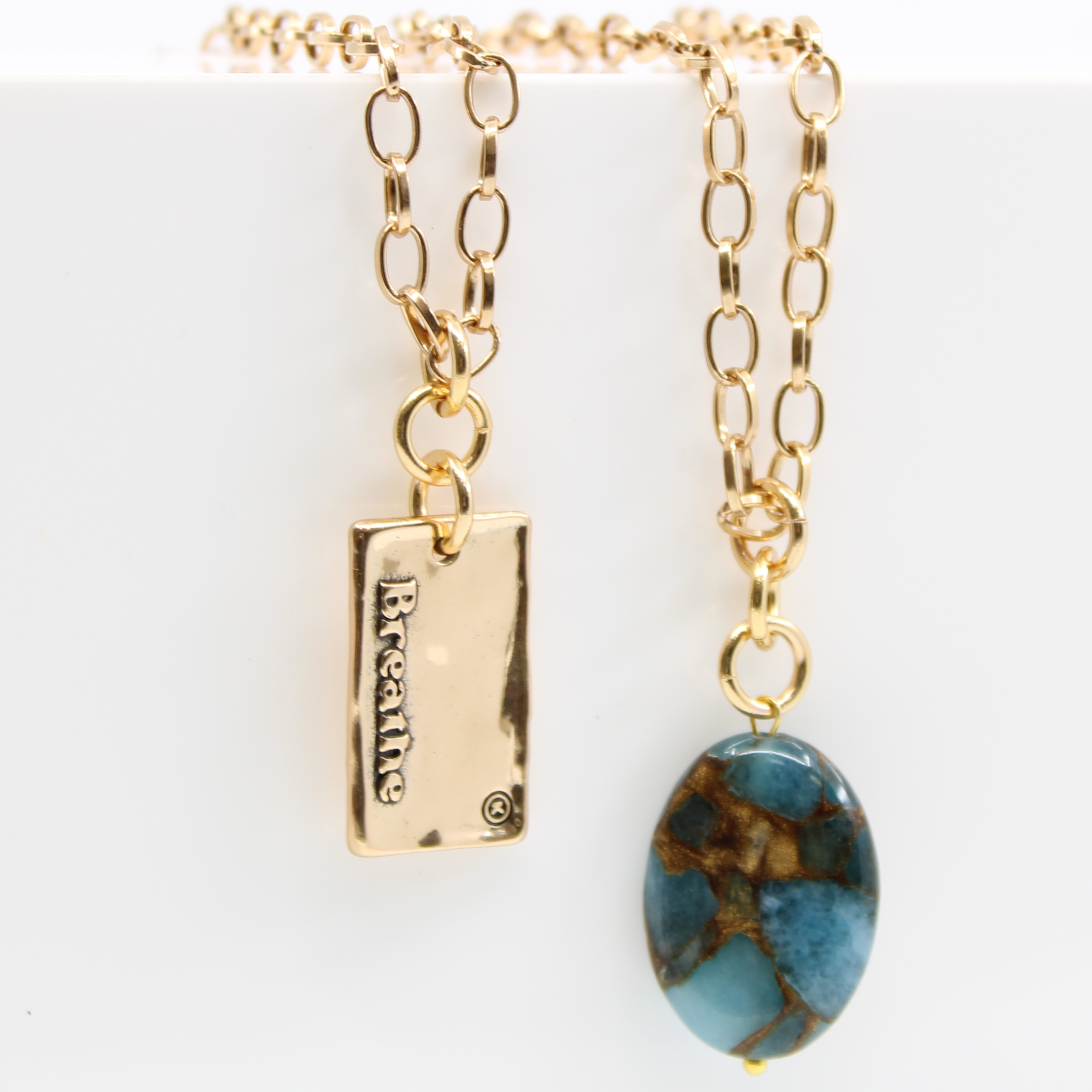 Katia Designs Breathe Original Lite Necklace in antique gold with aqua quartz pendant, delicate and elegant jewelry piece