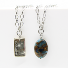 Katia Designs Breathe Original Lite Necklace with antique gold chain and aqua quartz pendant on a delicate necklace.