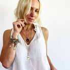 Katia Designs Breathe Original Lite Necklace with antique gold finish and aqua quartz pendant, lightweight and elegant jewelry piece.