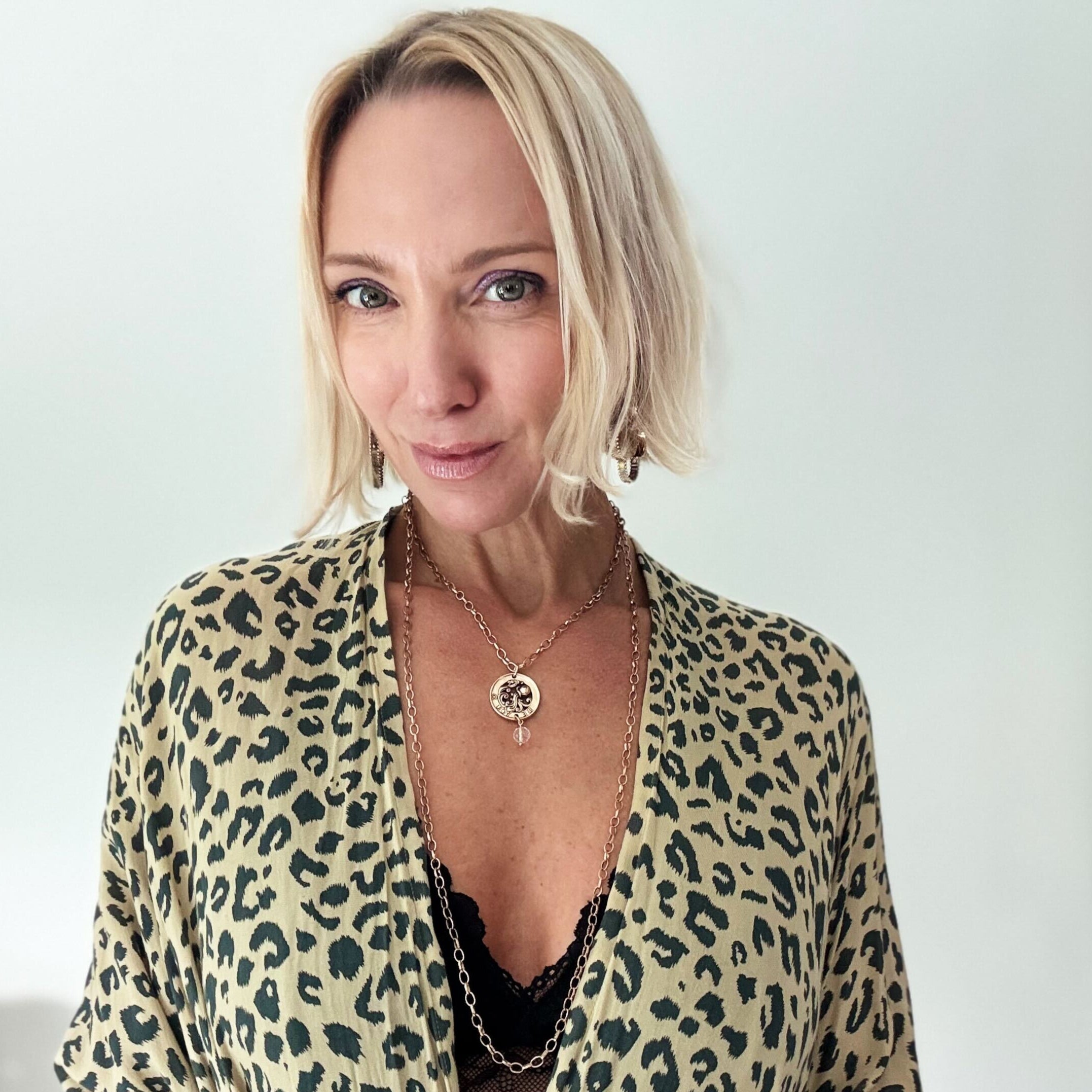 Katia Designs Be You Zodiac Original Lite Necklace in antique gold featuring Aries zodiac symbol and minimalist design.