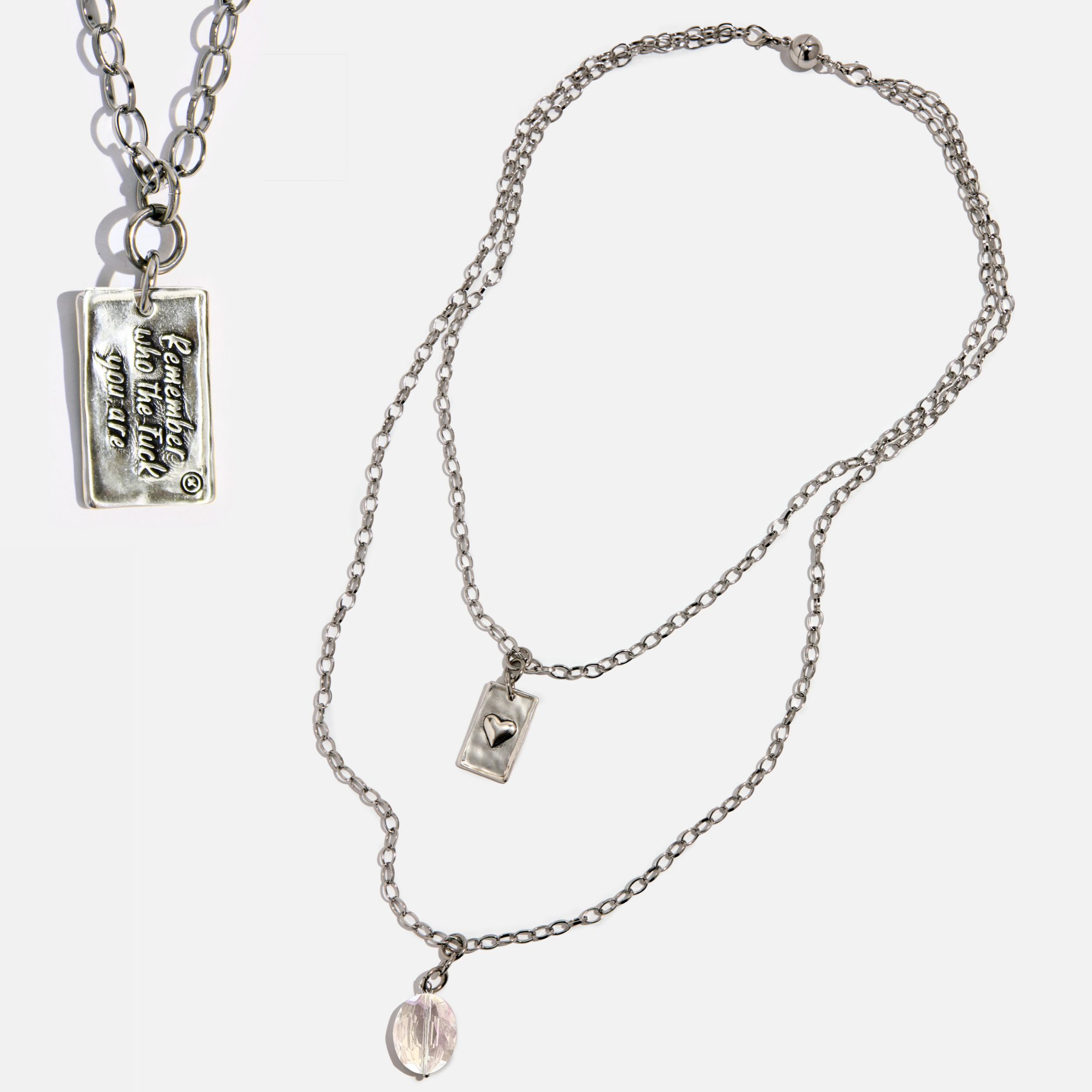 Katia Designs original Lite necklace in antique gold featuring a howlite clover and engraved "Remember Who the F*ck You Are" pendant.