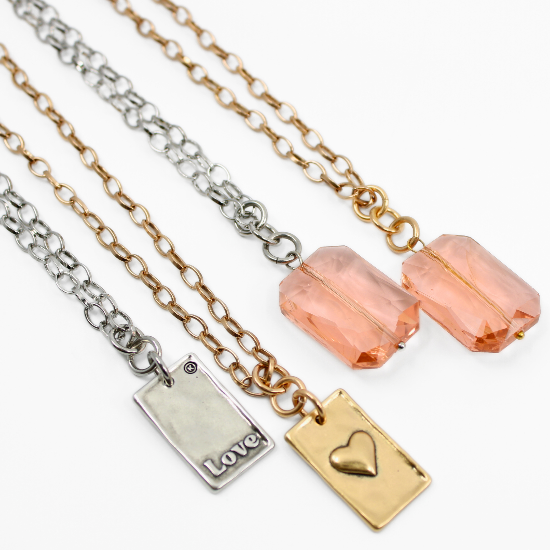 Katia Designs Love Heart Original Lite Necklace in antique gold with a delicate heart pendant, showcasing elegant jewelry design.