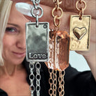 Katia Designs Love Heart Original Lite Necklace in antique gold with a delicate heart pendant, showcasing elegant jewelry craftsmanship.