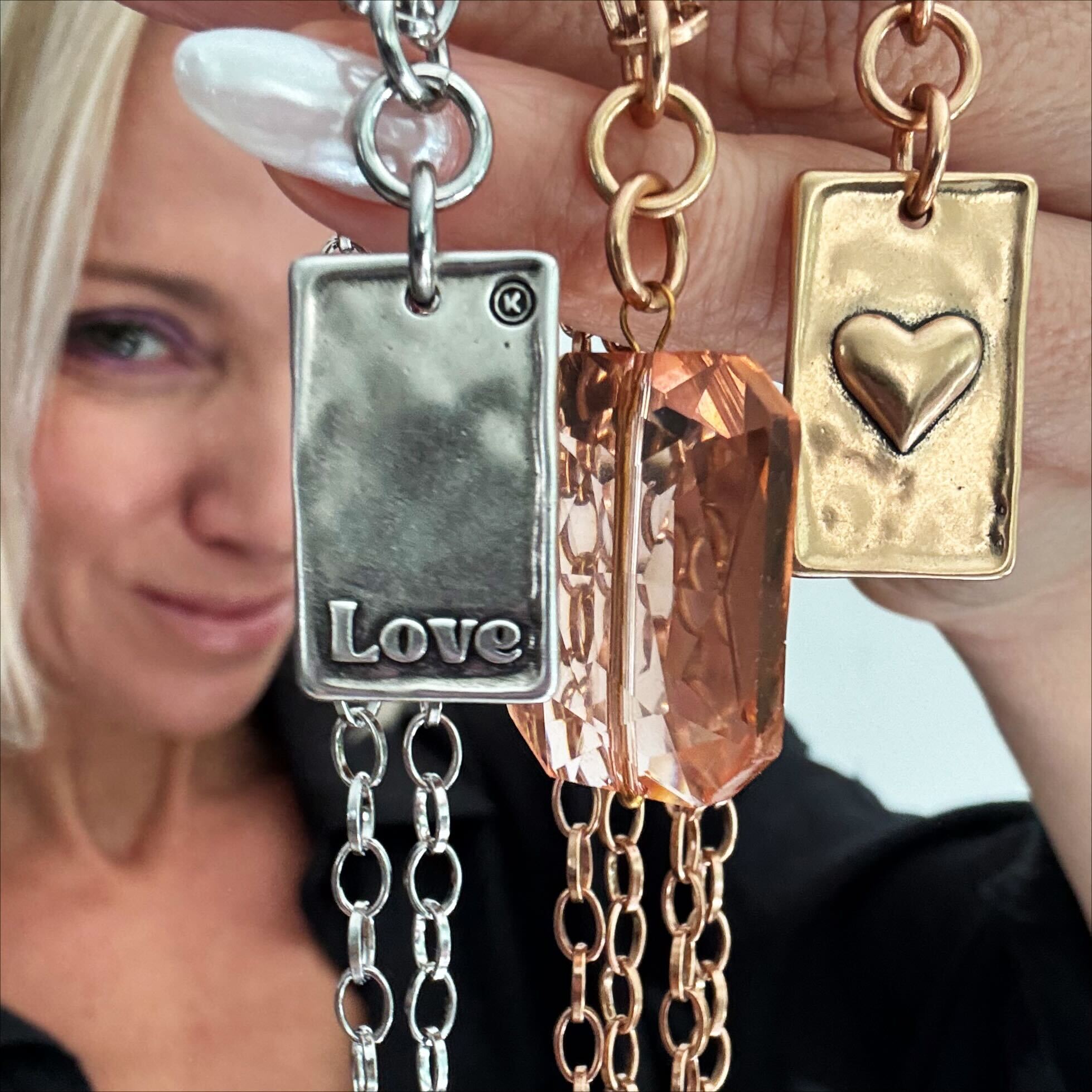 Katia Designs Love Heart Original Lite Necklace in antique gold with a delicate heart pendant, showcasing elegant jewelry craftsmanship.