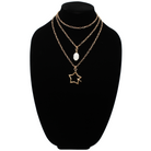 Katia Designs Peace & Love Star and Bird Original Lite Necklace in antique gold, featuring a star and bird pendant.