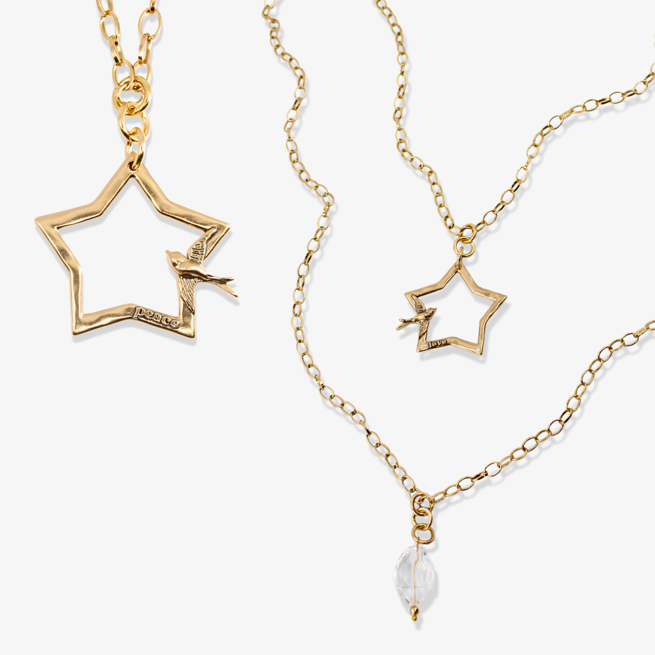 Katia Designs Peace & Love Star and Bird Original Lite Necklace in antique gold with delicate star and bird charms.