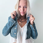 Katia Designs Peace & Love Star and Bird Original Lite Necklace in antique gold, featuring a delicate star and bird pendant.