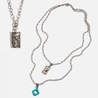 Katia Designs All Is Well Original Lite Necklace with antique gold chain and smoky crystal pendant, elegant and minimalist jewelry piece.