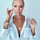 Katia Designs All Is Well Original Lite Necklace in antique gold with smoky crystal pendant, elegant and minimal jewelry piece
