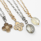 Katia Designs All is Well Clover Original Lite necklace with silver chain and smoky crystal pendant, elegant jewelry accessory.