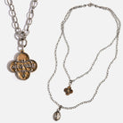 Katia Designs All is Well Clover Original Lite necklace with silver chain and smoky crystal pendant.