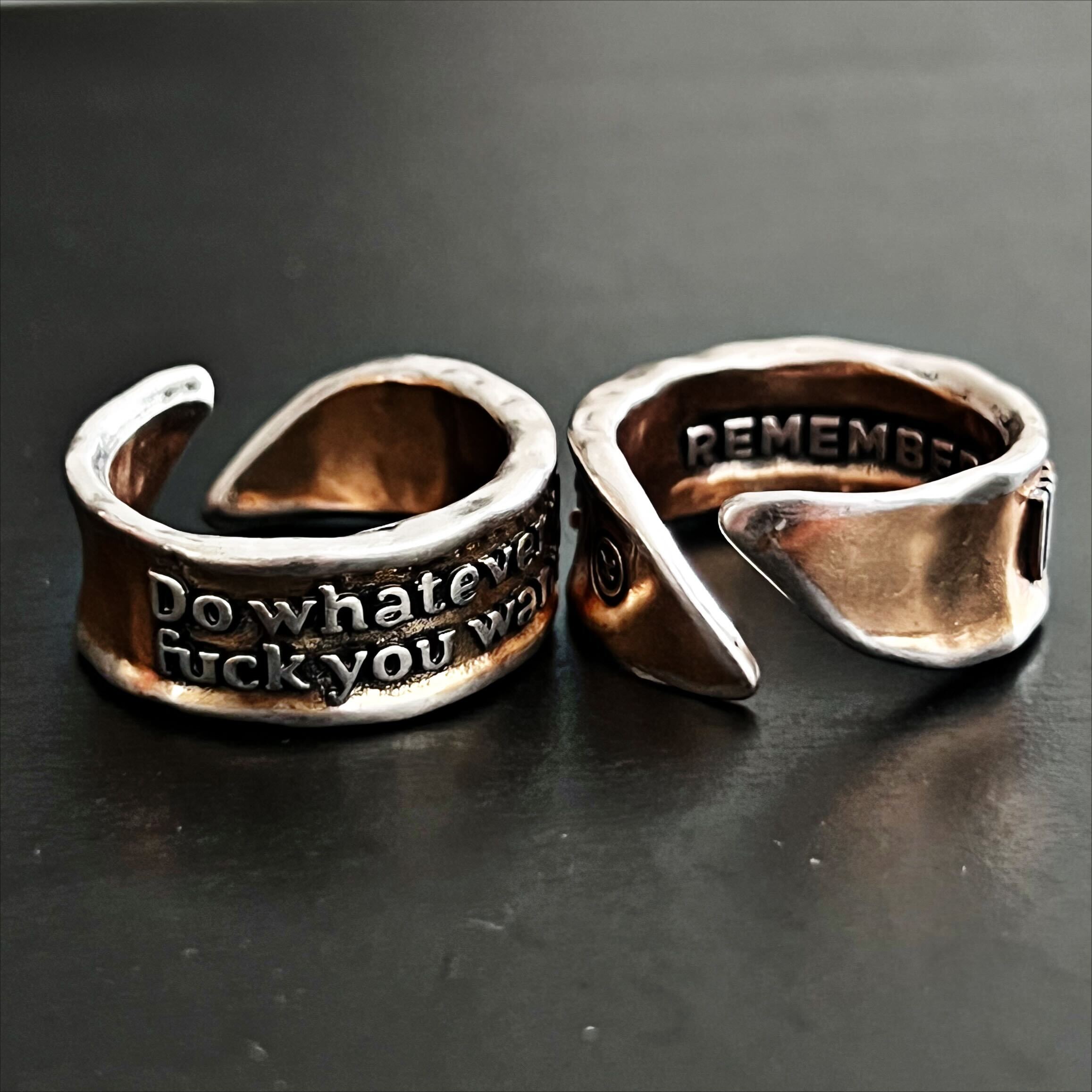 Katia Designs adjustable ring with bold "Do Whatever The F*ck You Want Remember" message, made of silver-tone metal.