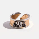 Katia Designs Just Breathe Remember adjustable ring with engraved motivational message on silver-tone band.