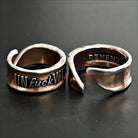 Katia Designs Unf*ckwithable Remember adjustable ring with engraved design, silver-toned metal, and a sleek, modern look.