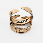 Katia Designs Trust Moon Phase adjustable silver ring with engraved moon phases, size 6-8, featuring celestial detail.