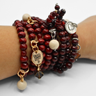 Katia Designs I Am Safe Heart wood boho wrap bracelet and necklace with antique gold accents, featuring a heart pendant and natural wood beads.