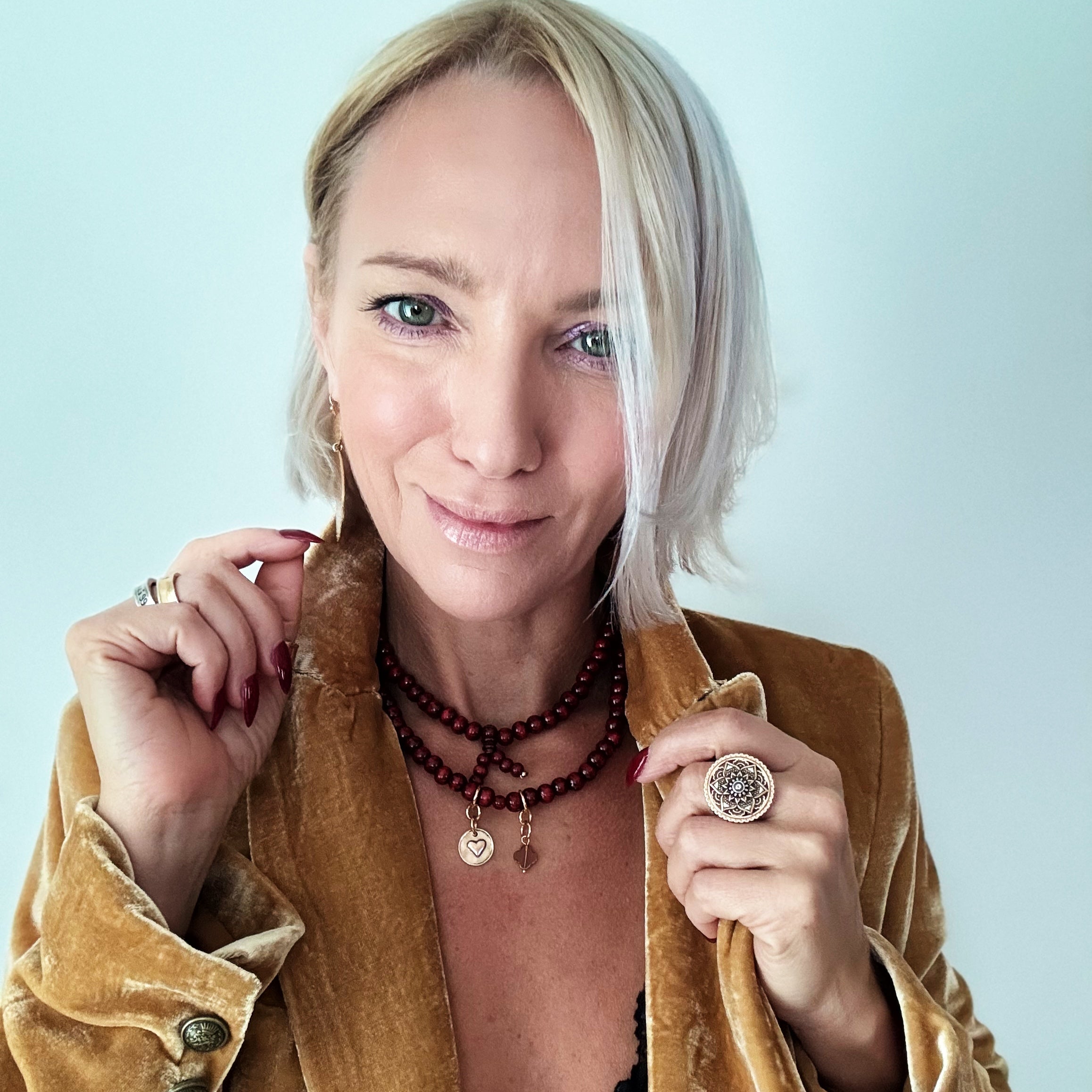 Katia Designs I Am Safe Heart Wood Boho Wrap Bracelet and Necklace with antique gold accents, crafted from natural wood.