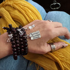 Wood boho wrap bracelet and necklace with a heart charm featuring grateful, thankful, blessed inscription by Katia Designs.