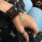 Katia Designs I Am Strong Heart wood boho wrap bracelet and necklace with natural wood beads and a heart charm.