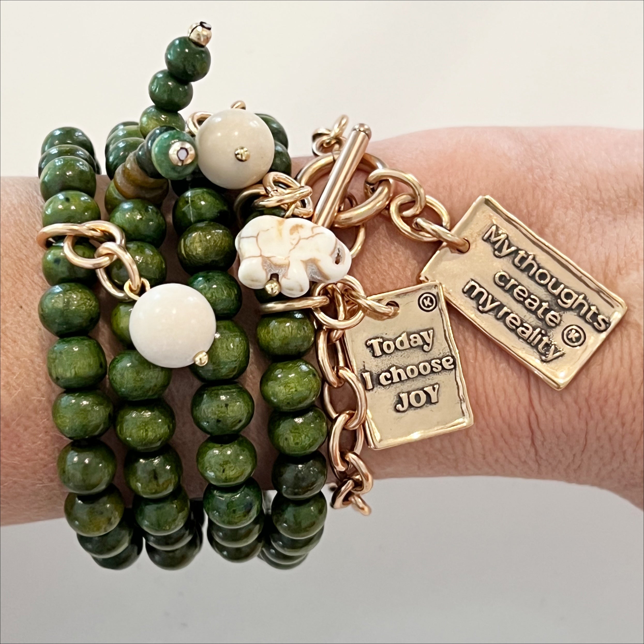 Katia Designs wood boho wrap bracelet and necklace with a heart charm, natural wood beads, and adjustable design.