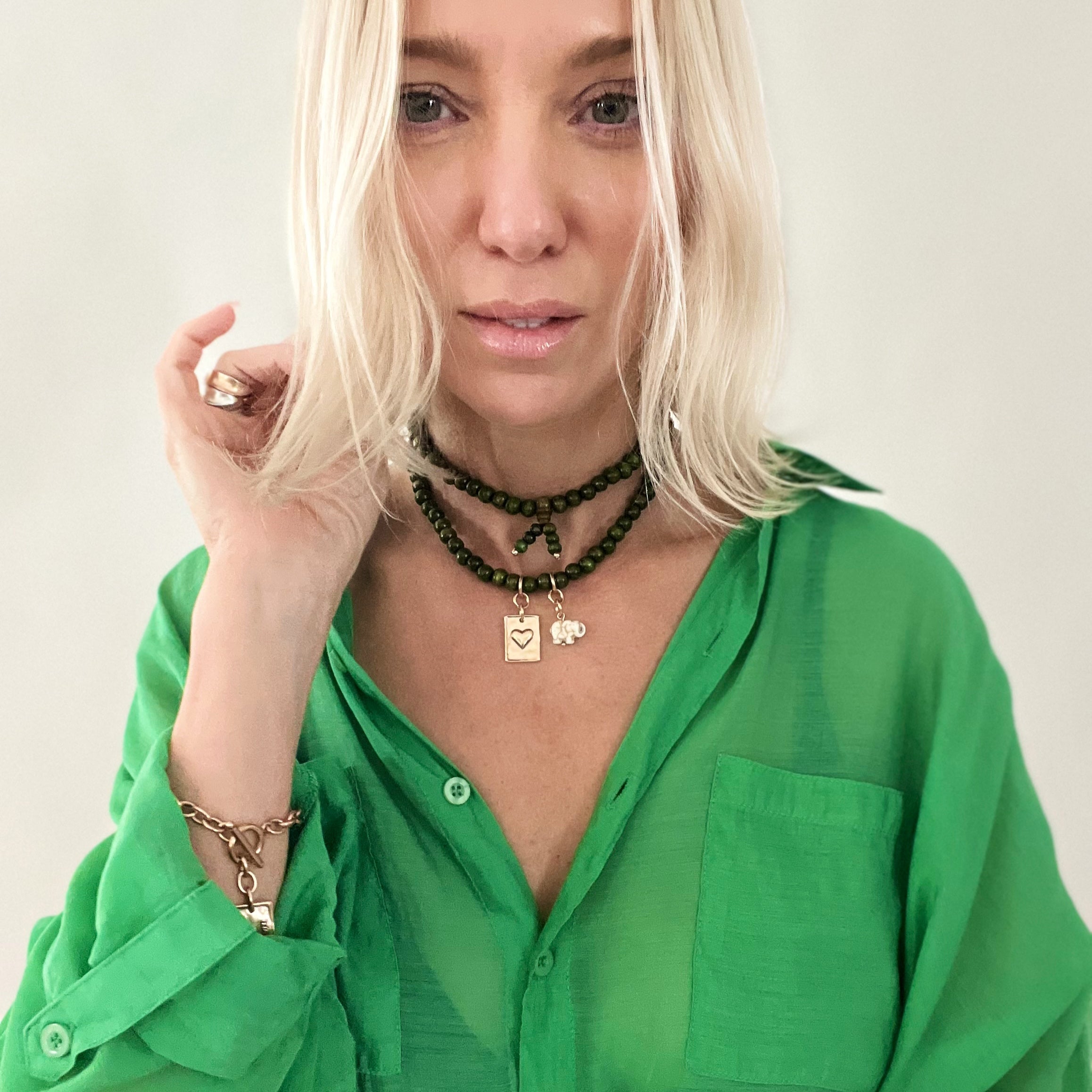 Katia Designs wood boho wrap bracelet and necklace with a heart charm, featuring natural wood beads and rustic boho style.