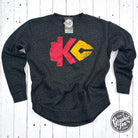 KC Arrowhead Black Leopard women's curved hem crewneck sweatshirt from The Graphic Tee, featuring a black leopard print design.