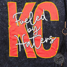 Mineral wash crew neck short sleeve T-shirt by The Graphic Tee, featuring bold "Fueled By Haters" graphic design.