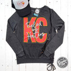 Mineral washed lace-up sweatshirt for women by The Graphic Tee, casual shirt with stylish design and comfortable fit.