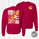 Deep red KC Groovy crewneck sweatshirt with graphic design, made by The Graphic Tee, shown on a plain background.