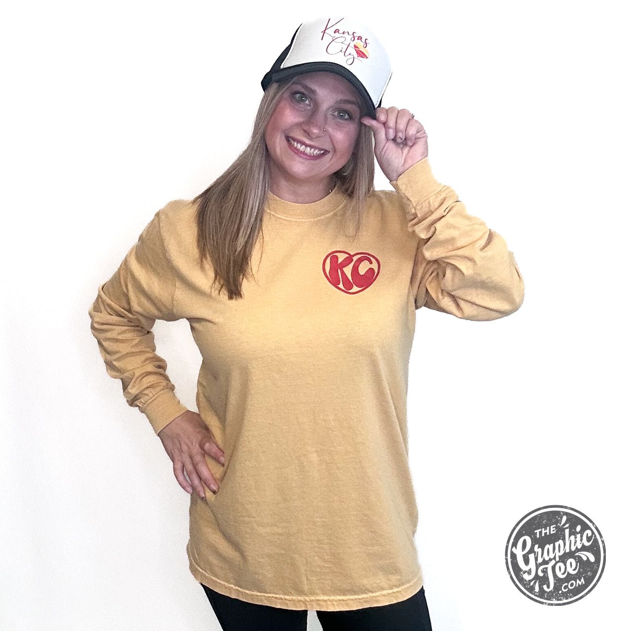 KC Groovy Mustard Comfort Colors long sleeve graphic tee, showing the mustard yellow shirt with retro design and brand label.