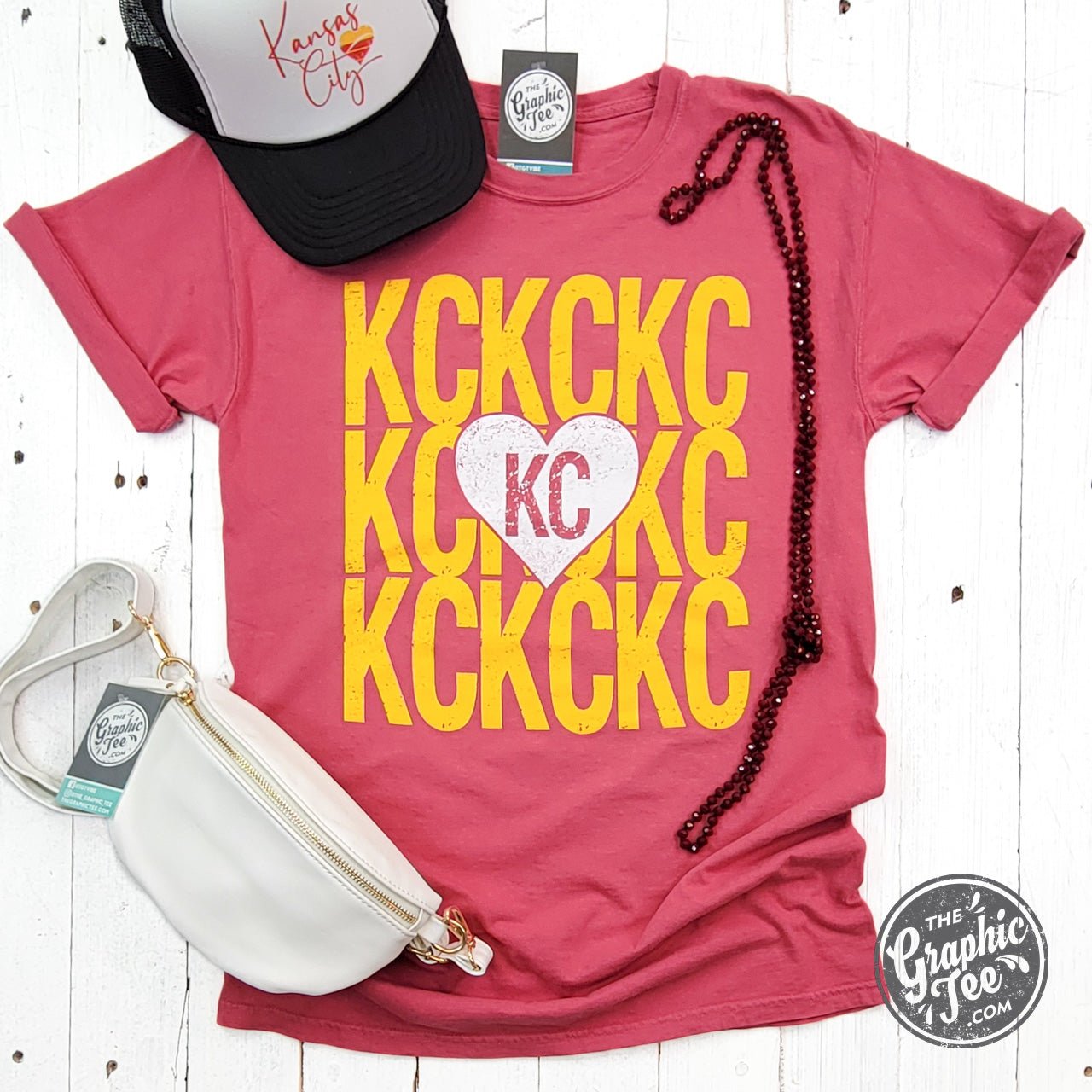 Crimson short sleeve crew neck graphic tee featuring a heart design from The Graphic Tee brand.
