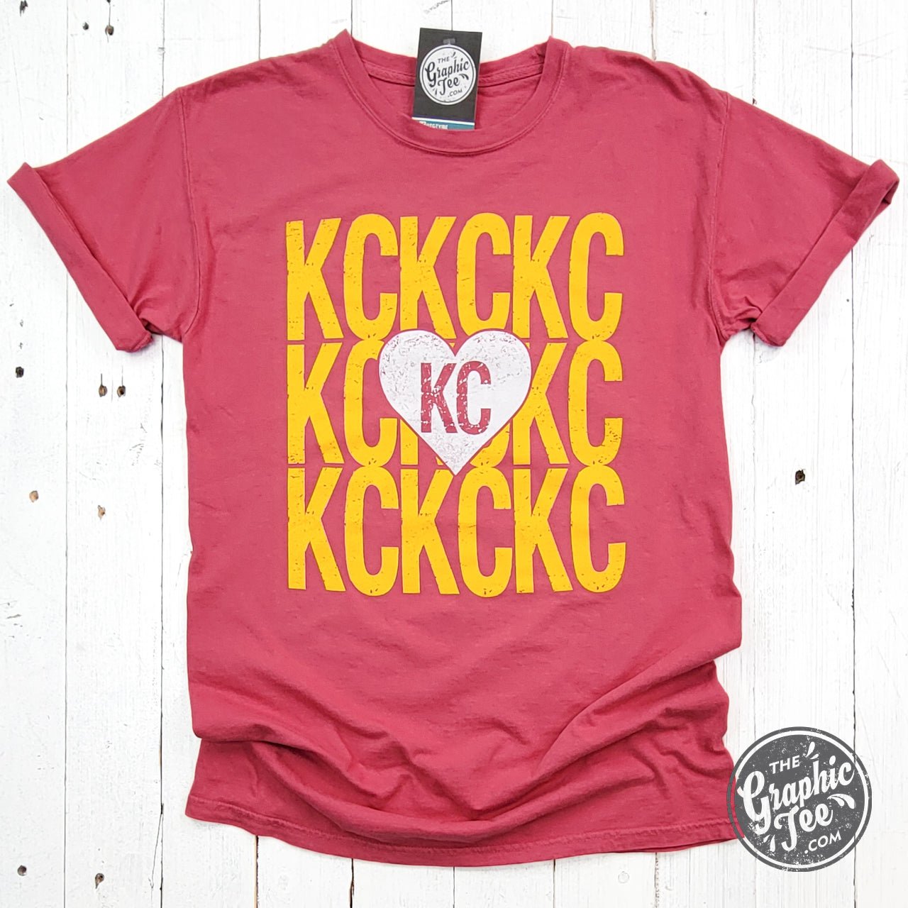 Crimson short sleeve crew neck graphic tee with heart design from The Graphic Tee, featuring a comfort wash finish.