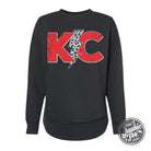 Black KC Lightning Bolt women's fleece sweatshirt with curved hem, featuring graphic lightning bolt design by The Graphic Tee.