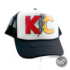 KC Lightning Bolt Foam Trucker Cap featuring a bold lightning bolt design on the front, adjustable snapback closure, and mesh back panels.