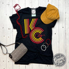 Black KC Ombre Graphic Tee by The Graphic Tee featuring a stylish ombre design on a casual short-sleeve shirt.
