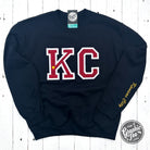 Black crewneck sweatshirt by The Graphic Tee with red glitter applique design, casual and stylish for everyday wear.