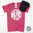 Red unisex short sleeve graphic tee featuring KC Rock design by The Graphic Tee, casual crew neck style for adults.